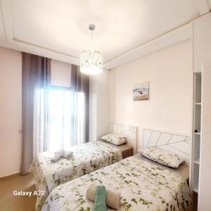 Safari Stay Appart front mer avec piscine