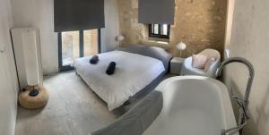 Maisons de vacances Maison exceptionnelle au coeur de Gordes avec piscine privee et vue panoramique : photos des chambres