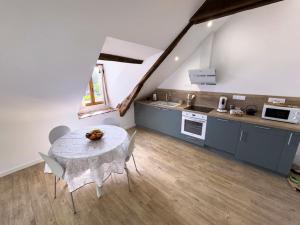 Appartements Le Logis de Trefle : photos des chambres