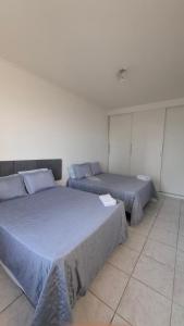 APARTAMENTO DE FRENTE a PRAIA SANTOS