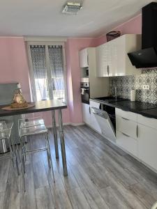 Appartements Jolie maison de ville : photos des chambres