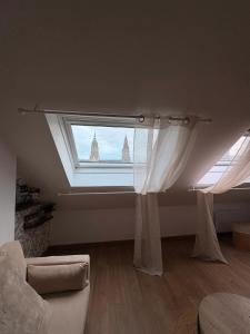 Appartements Le Nid dHistoire avec vue sur la cathedrale : photos des chambres