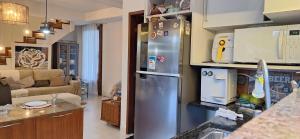 Casa praiana em condominio com lazer