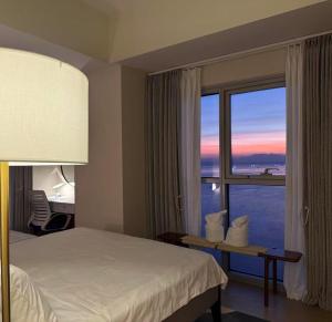 1BRFacing ManilaBay SunsetNear Okada Solaire 1Park