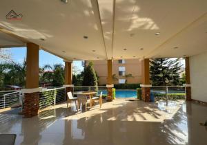 Palawan 2BR Apartment with Balcony and FREE Pool near Airport- B2 3Moonstone