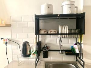 Apateu Studio Sharia - Unit lengkap, tinggal bawa koper! at Apartemen Bandaraya Tallasa City