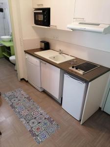 Appartements Appartement T2 climatise Piscine : photos des chambres