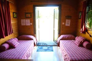 Campings La Dorepontaise ROULOTTE : photos des chambres