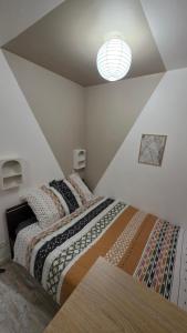 Appartements Le petit cocon centre ville : photos des chambres