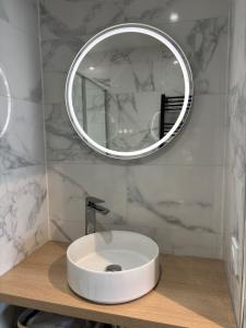 Appartements LE GOLDEN acces direct tramway Geneve avec parking : photos des chambres