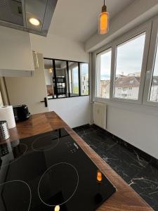 Appartements LE GOLDEN acces direct tramway Geneve avec parking : photos des chambres