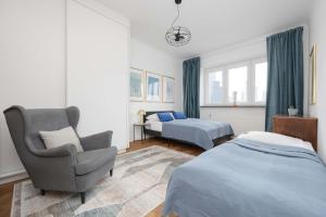 Warsaw Central Apartment by Noclegi Renters