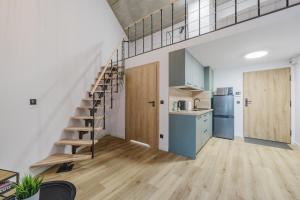 Osiedle Piastowskie Mezzanine Apartment by BookingHost