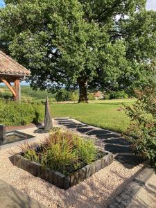 B&B / Chambres d'hotes La grange a Tissac : photos des chambres