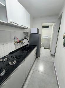 Kitnet - Pé na Areia