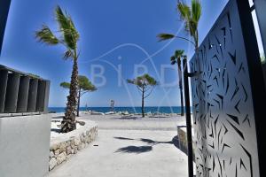 Waterfront apartment with private garden