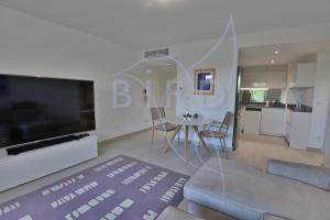 Waterfront apartment with private garden