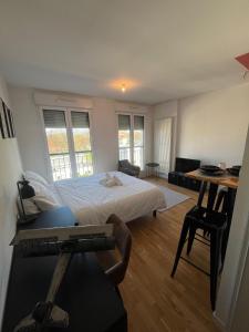 Appartements calme en plein centre : photos des chambres