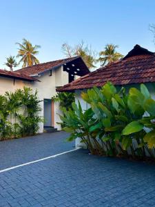 PPR Courtyard Guruvayur by LexStays