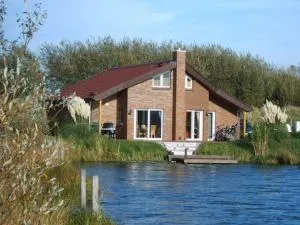 Wellnesshaus Stella Maris - mit Bootssteg - All Inklusive - Ihlienworth