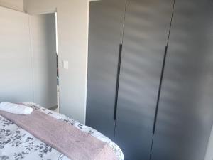 Arum Cove Bloubergstrand