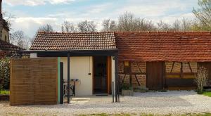 Maisons de vacances Joli studio a la ferme avec patio couvert : photos des chambres