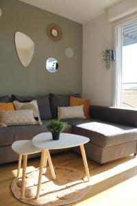 Appartements Logement lumineux pres de la mer et de la ville : photos des chambres
