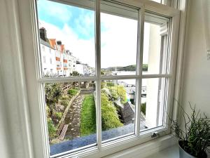 Riverside Apartment with Stunning Views & Patio