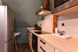 Appartements Appartement Beraweka avec Climatisation et Salle de Sport : photos des chambres