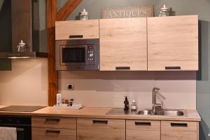 Appartements Appartement Beraweka avec Climatisation et Salle de Sport : photos des chambres