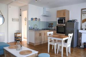 Appartements Le 8 ∙ Appartement cosy avec balcon vue sur mer : photos des chambres