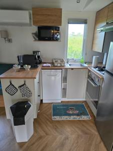 Campings FMLODGE mobilhome oranger : photos des chambres