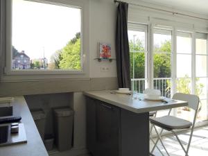 Appartements Downtown Apartment : photos des chambres