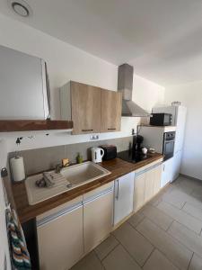 Appartements Studio cosy avec climatisation et terrasse : photos des chambres