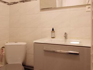 Appartements Downtown Apartment : photos des chambres
