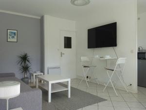 Appartements Downtown Apartment : photos des chambres