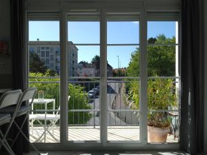 Appartements Downtown Apartment : photos des chambres