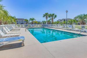 Balcony and Pool Access Serene Little River Retreat