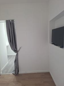 Appartements L-Instant Simplicite - Dormir Comme A La Maison : photos des chambres