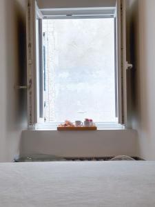 Quarto privativo com banheiro compartilhado