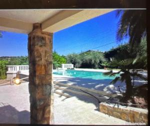 Appartements Appartement T4 a l-etage d-une villa avec piscine et jardin : photos des chambres