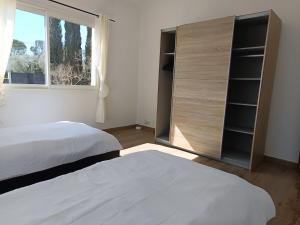 Appartements Appartement T4 a l-etage d-une villa avec piscine et jardin : photos des chambres