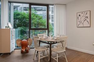 Ultimate Location Chic 2BR Rooftop Pool n Parking