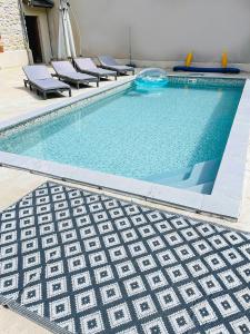 Maisons de vacances Maison cosy avec jardin & piscine chauffee : photos des chambres