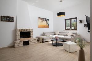 Villa Andrija Family Dream with heated pool at the sea with beautiful garden, outside cinema and kids playground