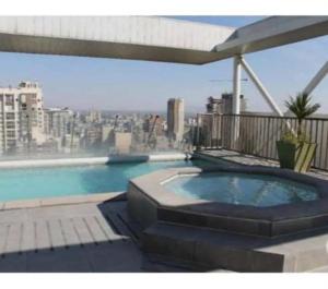 Excelente depto central con piscina Petfriendly Para 3 a 4 personas