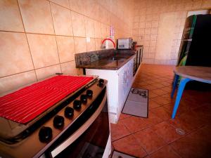 Casa com piscina e churrasqueira 1 Min da praia