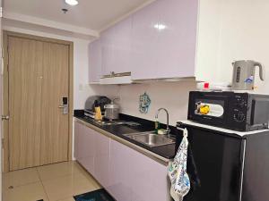 Hannahs Crib at Shore Residences with Balcony and Pool View