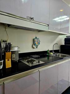 Hannahs Crib at Shore Residences with Balcony and Pool View