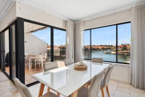 Pet Friendly Luxe Canals Waterfront Retreat with Private Jetty & Spa